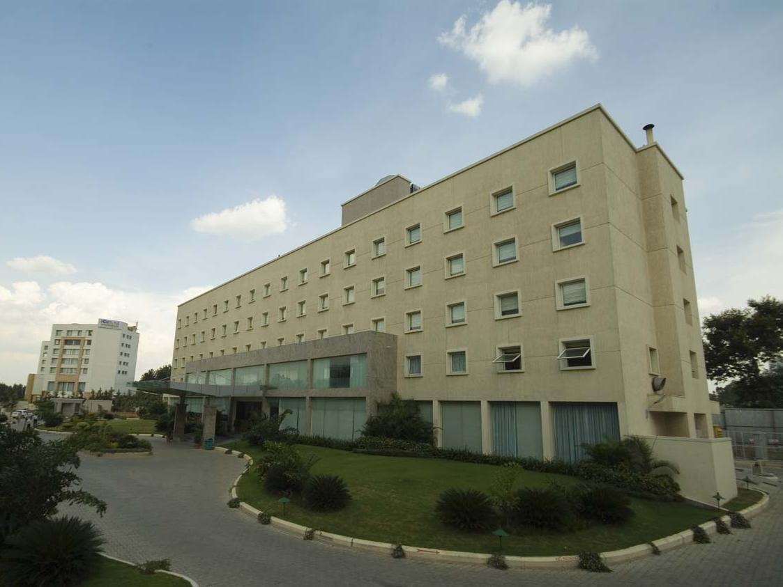 Radha Hometel Bangalore Buitenkant foto